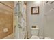 Small bathroom with shower/tub combo and tile surround at 1383 Alston Bay Blvd, Apopka, FL 32703