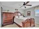 Bedroom with an ornately carved wooden bed frame at 1383 Alston Bay Blvd, Apopka, FL 32703