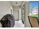 Screened porch with grill and access to backyard at 1383 Alston Bay Blvd, Apopka, FL 32703