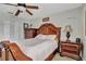 Bedroom with a wooden bed frame and chest of drawers at 1383 Alston Bay Blvd, Apopka, FL 32703