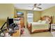 Bedroom with a wooden bed frame and workspace at 1383 Alston Bay Blvd, Apopka, FL 32703