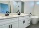 Modern bathroom boasts double vanity, soaking tub, and a walk-in shower at 2827 Sw 146Th Place Rd, Ocala, FL 34473