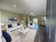 Open living room with entryway view, showcasing a spacious and modern design at 2827 Sw 146Th Place Rd, Ocala, FL 34473