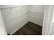 Spacious walk-in closet with wire shelving at 2827 Sw 146Th Place Rd, Ocala, FL 34473