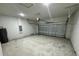 Clean and spacious garage with automatic opener and ample storage space at 13053 Sw 36Th Ct, Ocala, FL 34473