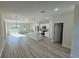 Modern kitchen featuring stainless steel appliances and an island at 13053 Sw 36Th Ct, Ocala, FL 34473
