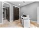 Home office with built-in desk and access to bathroom at 1451 Lyndale Blvd, Winter Park, FL 32789