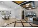 Elegant entryway showcases a stone accent wall and views into the living room at 1451 Lyndale Blvd, Winter Park, FL 32789