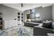 Cozy living room with built-in shelving and large windows at 1451 Lyndale Blvd, Winter Park, FL 32789