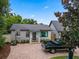 Cute bungalow home with a paved driveway and basketball court at 1451 Lyndale Blvd, Winter Park, FL 32789