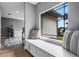 Built-in window seat with storage and cozy pillows at 1451 Lyndale Blvd, Winter Park, FL 32789
