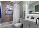 Clean bathroom with tub shower combo, and updated vanity at 1451 Lyndale Blvd, Winter Park, FL 32789