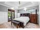 Spacious bedroom with French doors leading to backyard at 1451 Lyndale Blvd, Winter Park, FL 32789