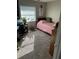 Small bedroom with a twin-size bed and carpeted floor at 3416 Unity Tree Dr, Edgewater, FL 32141