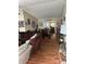 Spacious living room with hardwood floors and a dining area at 3416 Unity Tree Dr, Edgewater, FL 32141