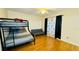 Bedroom with bunk beds and a sofa at 2214 Calabria Ave, Davenport, FL 33897