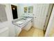 Clean bathroom with granite countertop and updated fixtures at 2214 Calabria Ave, Davenport, FL 33897