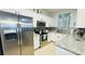 Kitchen with stainless steel appliances and granite countertops at 2214 Calabria Ave, Davenport, FL 33897