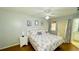 Spacious bedroom with a king-size bed and access to a bathroom at 2214 Calabria Ave, Davenport, FL 33897