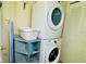 Laundry room with washer, dryer, and storage at 2214 Calabria Ave, Davenport, FL 33897