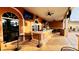 Outdoor bar area with seating and TV at 2214 Calabria Ave, Davenport, FL 33897