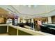 Restaurant interior with tables, bar, and high ceilings at 2214 Calabria Ave, Davenport, FL 33897