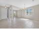 Spacious living room with tile floors and lots of natural light at 4814 Terra Sole Pl, St Cloud, FL 34771