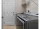 Laundry room with washer, dryer, and shelving at 4814 Terra Sole Pl, St Cloud, FL 34771
