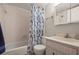 Clean bathroom with shower/tub combo and updated vanity at 408 E Orlando Ave # 13A, Ocoee, FL 34761