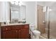 Bathroom with shower, toilet, granite countertop, and vanity at 7513 Marker Ave, Kissimmee, FL 34747