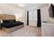 King bed, light wood furniture, and mounted TV at 7513 Marker Ave, Kissimmee, FL 34747