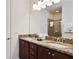 Double vanity bathroom with granite countertops at 7513 Marker Ave, Kissimmee, FL 34747