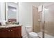 Bathroom with shower and granite vanity at 7513 Marker Ave, Kissimmee, FL 34747