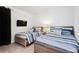 Bedroom with two twin beds, nightstands, and carpeting at 7513 Marker Ave, Kissimmee, FL 34747