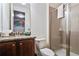 Bathroom with shower, toilet, granite countertop, and vanity at 7513 Marker Ave, Kissimmee, FL 34747