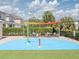 Community spray park with shade structures and seating at 7513 Marker Ave, Kissimmee, FL 34747