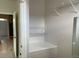 Walk-in closet with wire shelving and a mirrored door at 6673 Time Square Ave # 102, Orlando, FL 32835