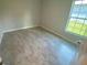 Bright bedroom with tile flooring and window at 541 Rhodes Dr, Deland, FL 32720