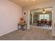 View of dining room and kitchen from entryway at 331 Douglas Dr, Eustis, FL 32726