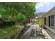 Large backyard with patio, shed, and mature trees at 331 Douglas Dr, Eustis, FL 32726