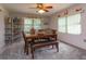 Dining room with wood table, seating, and ceiling fan at 331 Douglas Dr, Eustis, FL 32726