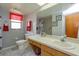 Clean bathroom with a single sink vanity and shower/tub combo at 331 Douglas Dr, Eustis, FL 32726