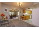 View of dining room and kitchen from entryway at 331 Douglas Dr, Eustis, FL 32726