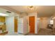 Kitchen with white refrigerator and wood cabinets at 331 Douglas Dr, Eustis, FL 32726