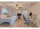 Versatile bedroom featuring a bed and home office setup at 1522 Gainesville Dr, Deltona, FL 32725