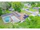 Aerial view showing house with pool, solar panels and large yard at 1522 Gainesville Dr, Deltona, FL 32725