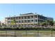 Multi-story hotel building with balconies and pool at 30931 Sunset Dr, Tavares, FL 32778