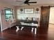 Charming dining area with built-in bench seating and farmhouse table at 30931 Sunset Dr, Tavares, FL 32778