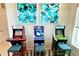 Game room with arcade games and seating at 7770 Sandy Ridge Dr # 208, Reunion, FL 34747