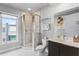 Bathroom with walk-in shower and window at 7770 Sandy Ridge Dr # 208, Reunion, FL 34747